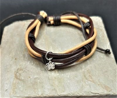 Friendship bracelet with flower charm